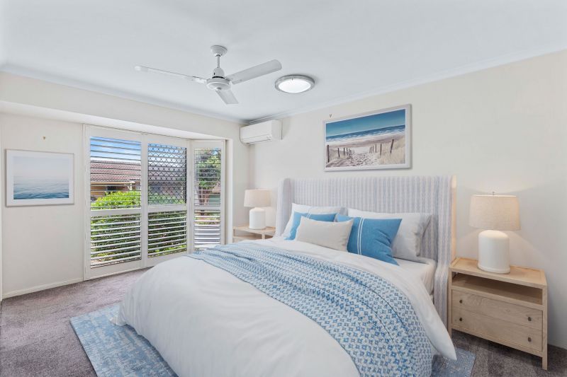 2-bedroom villa with a fresh modern update & garage