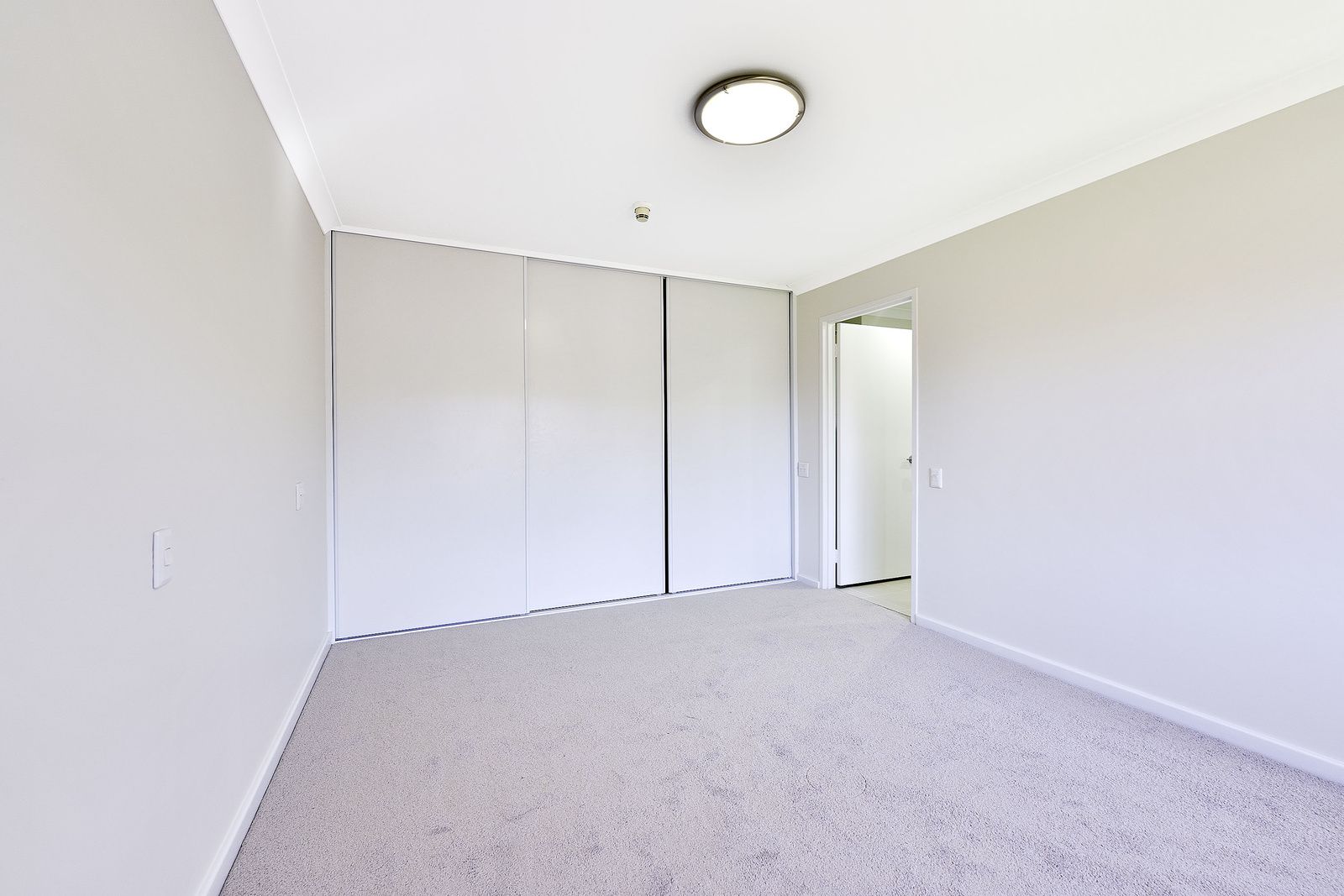 Bright corner apartment close to village amenities