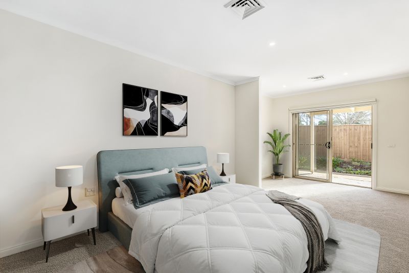 Spacious master bedroom with additional sunny retreat!