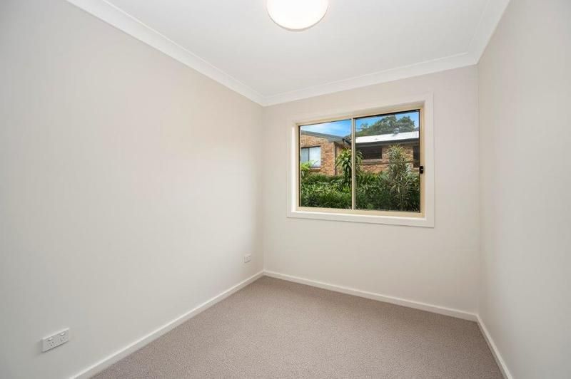 Modern Living with Sunroom and Entertainer’s Balcony