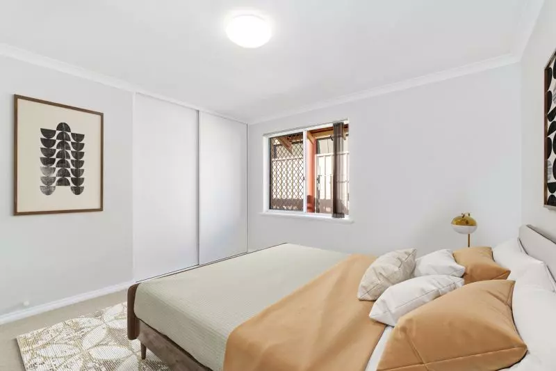 SOLD.  Live your best life in this light & bright villa in a fabulous coastal location!