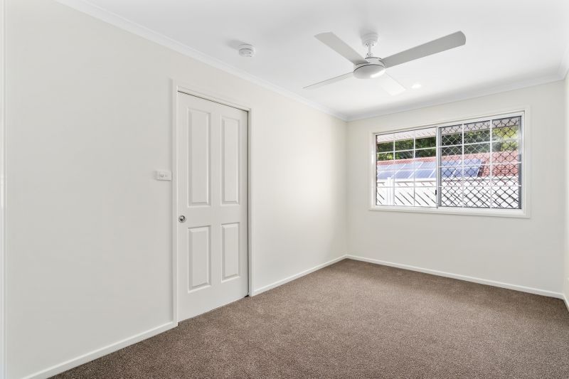 Beautiful two-bedroom, one bathroom villa with enclosed rear entertaining area.