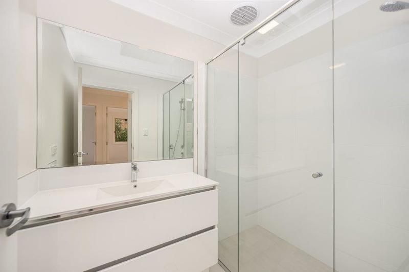 Modern Living with Sunroom and Entertainer’s Balcony