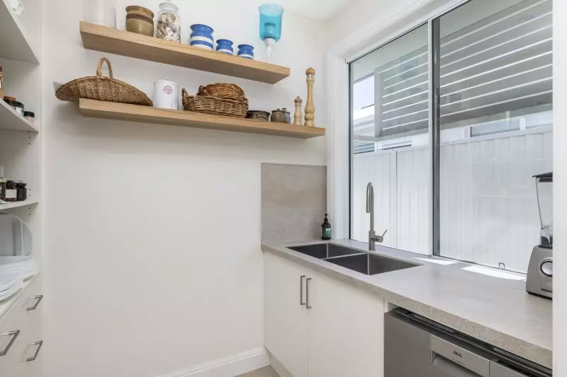 Light‑Filled Custom Home with Peaceful Greenspace Setting