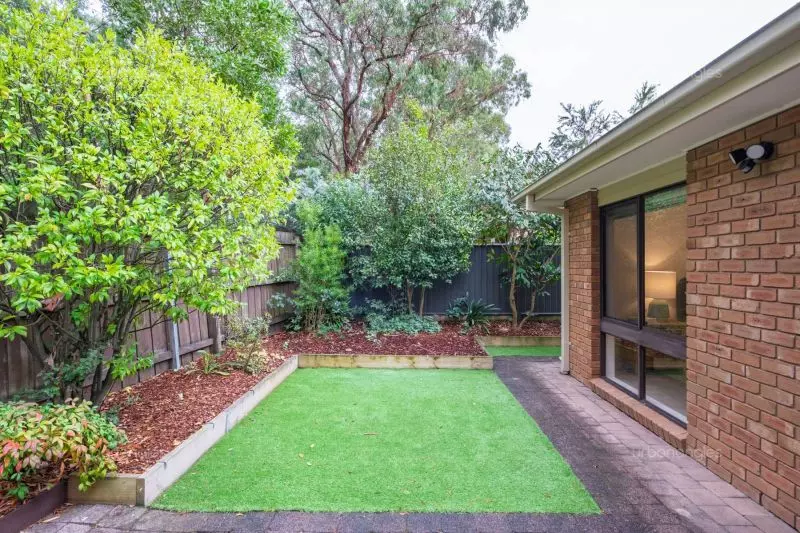 Exclusive two-bedroom villa featuring a pristine backyard