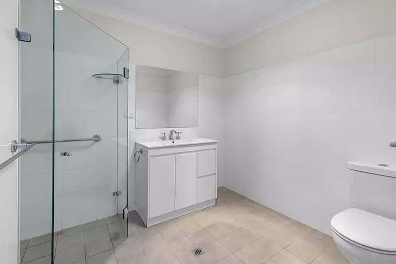 This elegant north east facing two bedroom unit offers refined living in a peaceful, private setting.