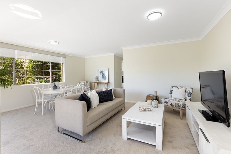 Surrounded by lovely gardens, beautifully renovated ground floor sun-filled unit, right opposite the croquet lawn.