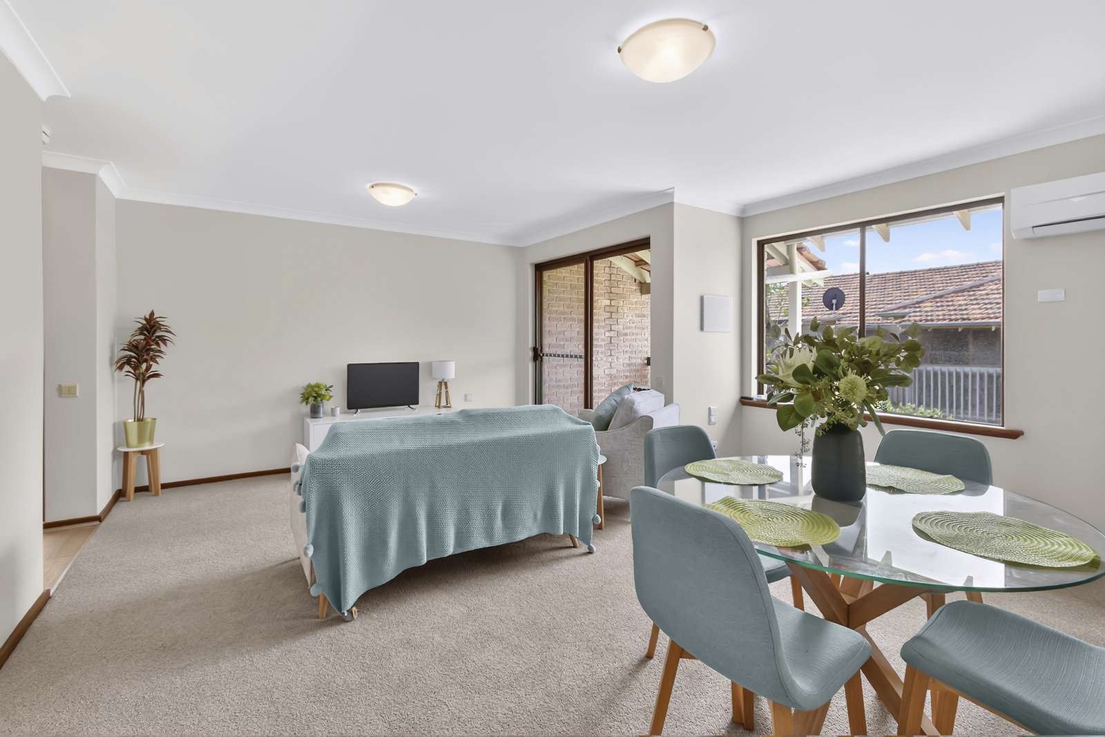 Freshly updated villa with garden views & sunny east-facing balcony