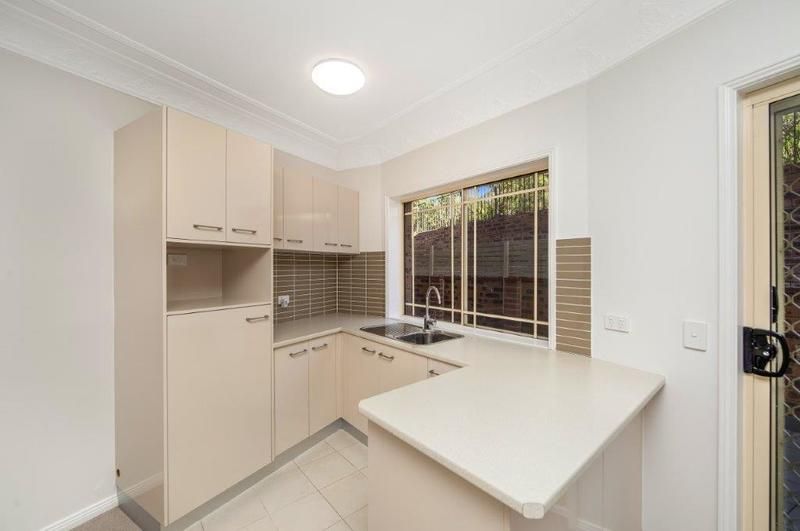 Spacious, Modern Apartment with Private Courtyard and Support Services