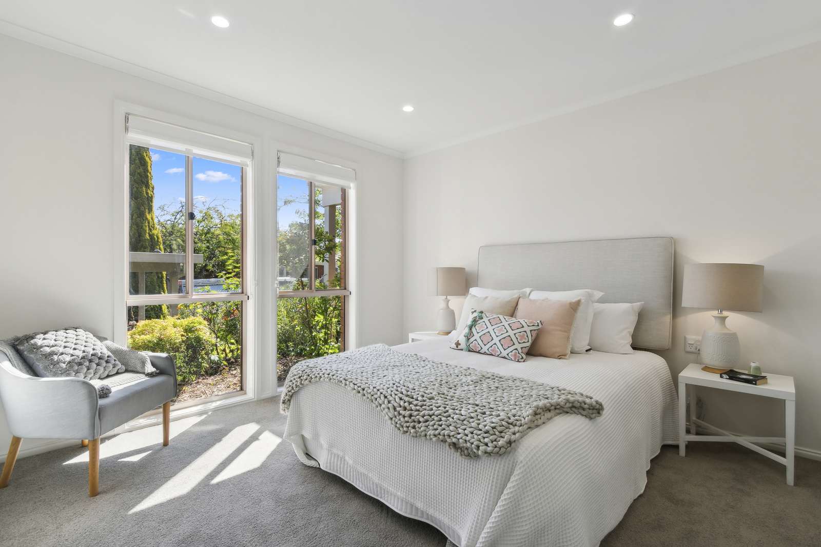 Exclusive three-bedroom villa featuring a pristine backyard