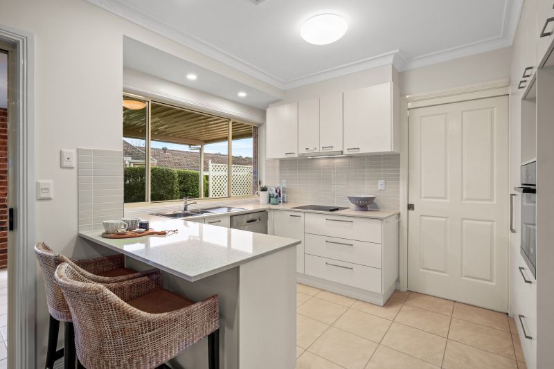 East facing villa with rear patio perfect for entertaining.