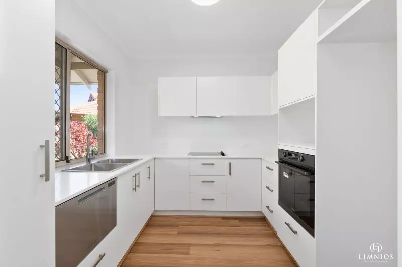 Light, bright 2 Bedroom Villa with Modern Upgrades in a Prime Location!