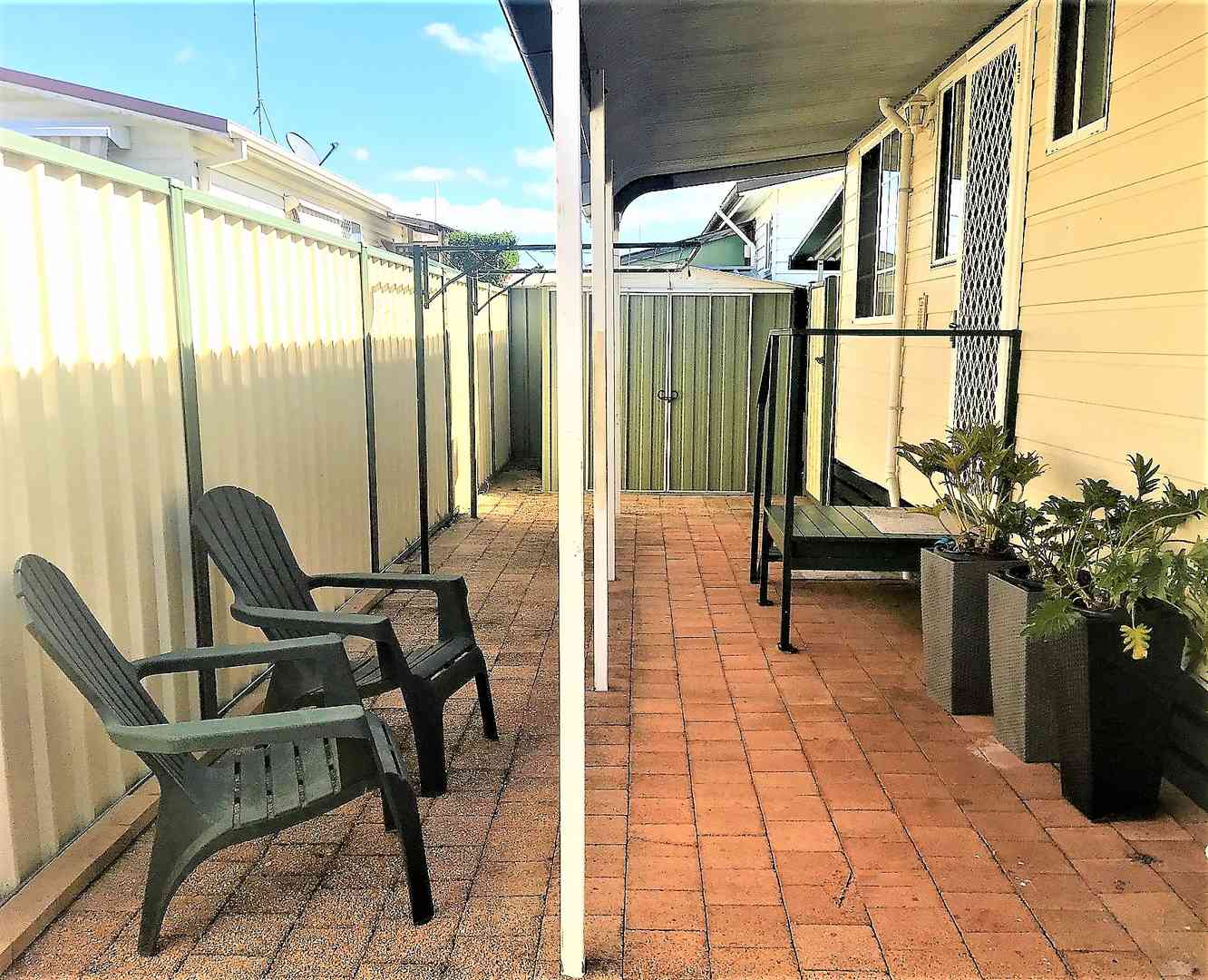 Two bedroom home on a large site,  a  short stroll away from recreation area, lush bushland and shopping centre