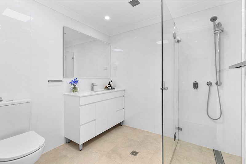 Beautifully renovated 2 bedroom unit with sunny balcony and light-filled throughout.