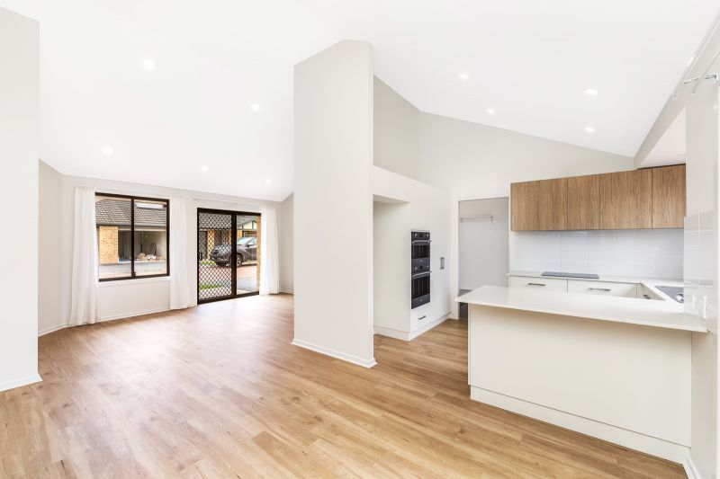 2 bedroom, 1.5 bathroom villa with pet friendly rear yard.