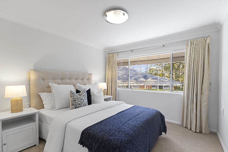 Beautifully presented unit close to clubhouse with district views.