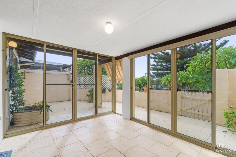 SOLD! A bright, light filled unit with a sunroom and leafy outlook