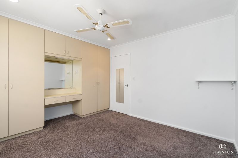 SOLD! A bright, light filled unit with a sunroom and leafy outlook