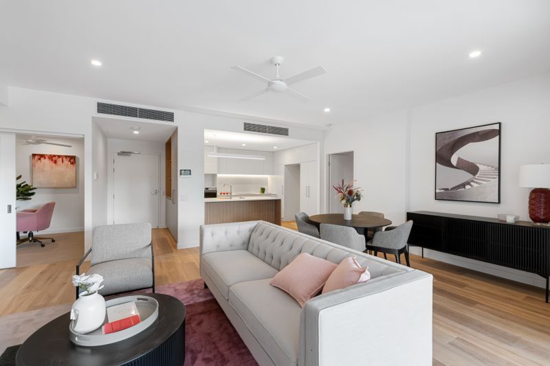 Enjoy a large balcony overlooking the village gardens