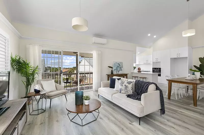 Gorgeously renovated 3 bedroom unit with modern look, level access and leafy district views.