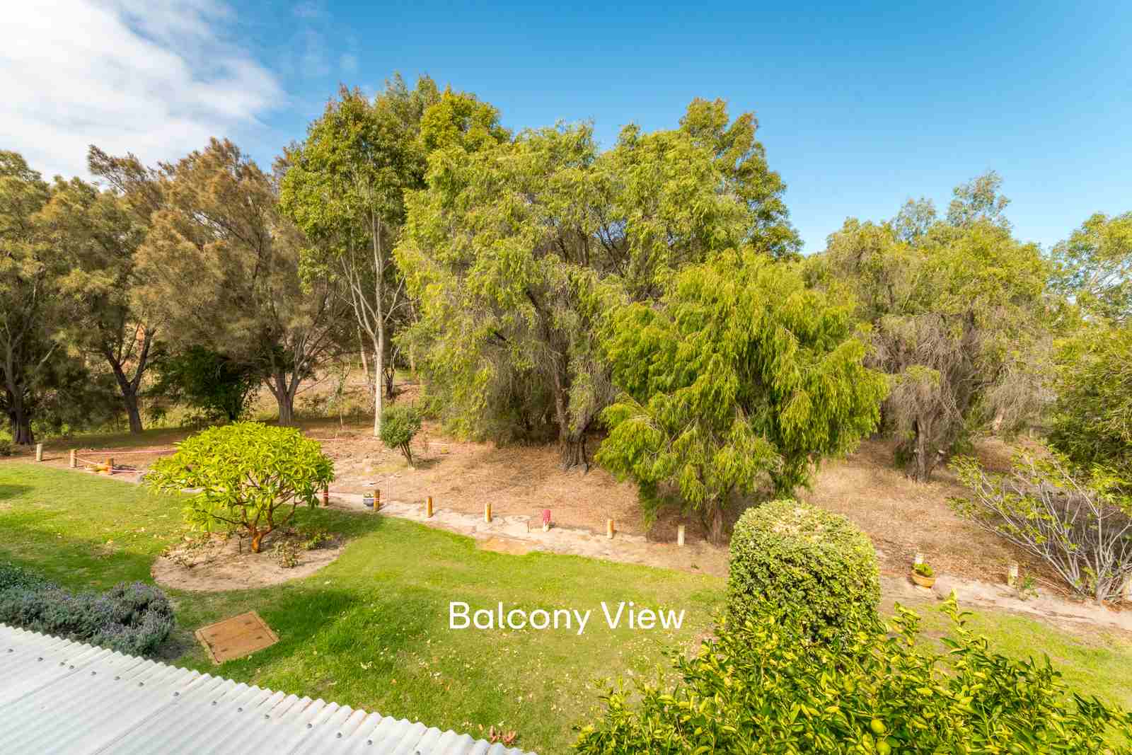 Light-filled two-bedroom villa with park views from the balcony