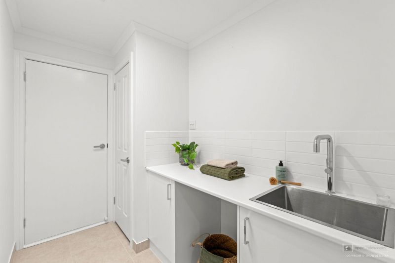 Beautifully Refurbished Two-Bedroom Home Opposite the Community Centre