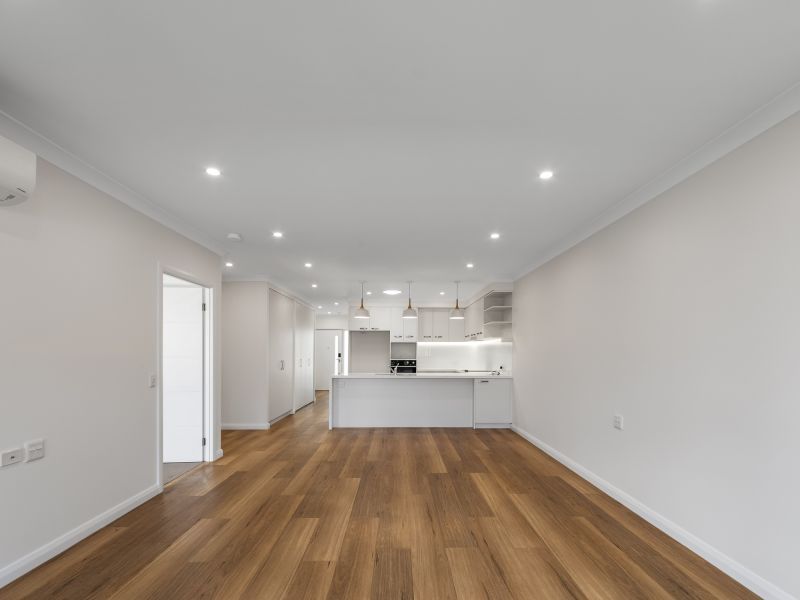 Open-plan two-bedroom villa with sun-filled alfresco area