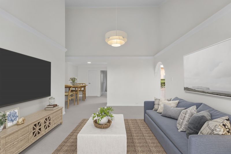 Immaculately maintained upper-level unit with district views and easy access ramp.