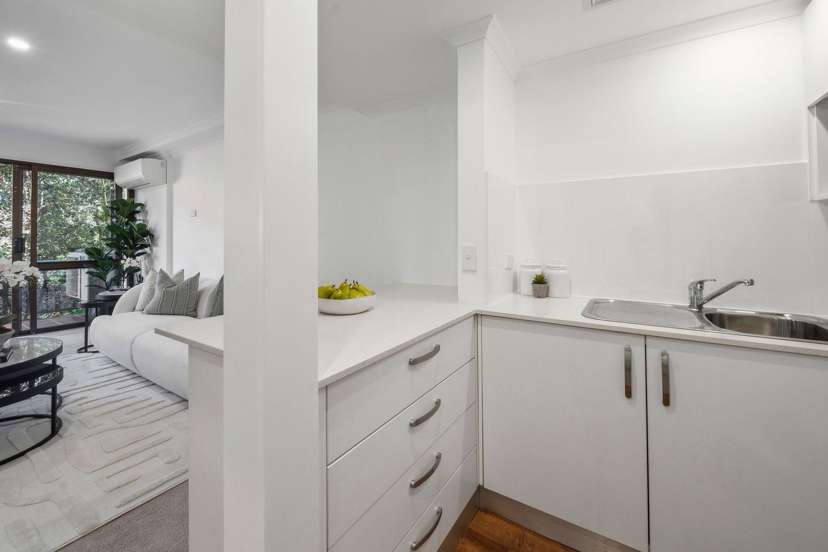A serviced apartment surrounded by garden greenery