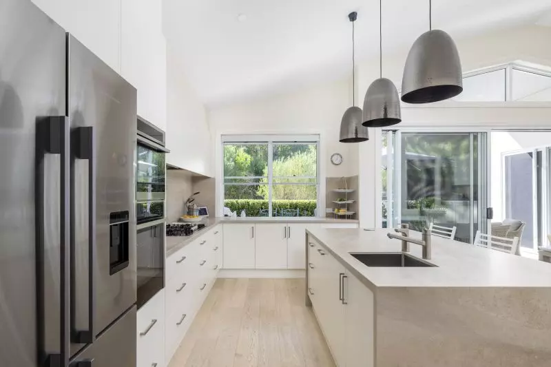 Light‑Filled Custom Home with Peaceful Greenspace Setting