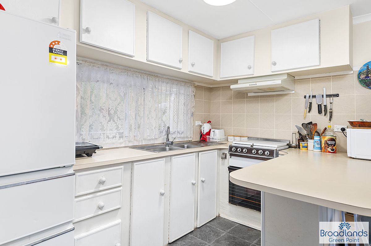 UNDER CONTRACT - Garden View Location - Two Bedrooms - Great Presentation