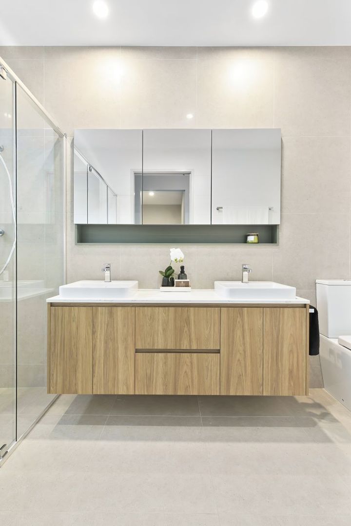 STUNNING DISPLAY HOME FACING TRANQUIL LAKE