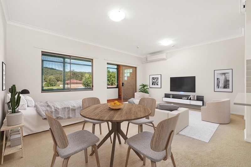 Ground floor studio apartment with East facing enclosed balcony