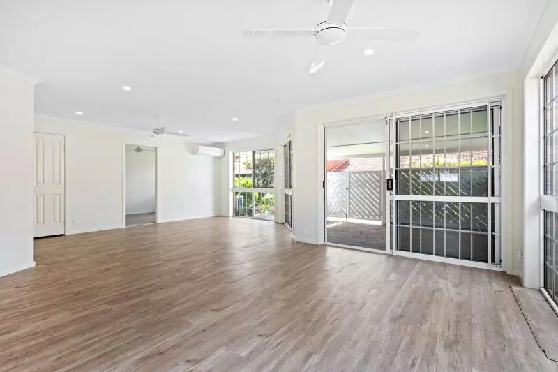 Beautiful two-bedroom, one bathroom villa with covered rear entertaining area.