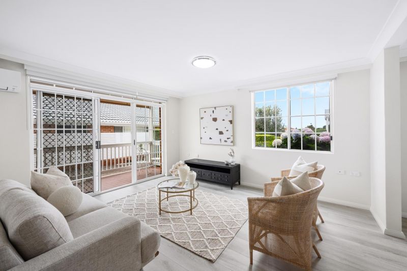 Fully renovated, contemporary style 3 bedroom unit with garden surrounds.