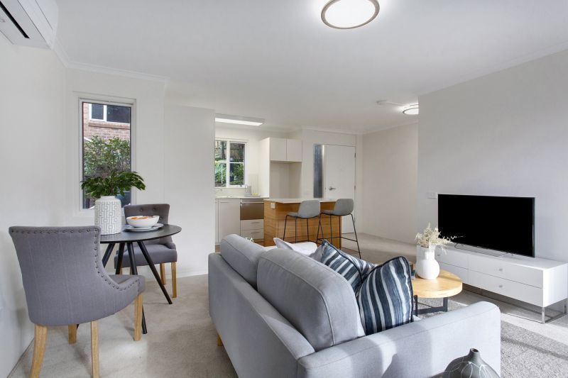 Serene two-bedroom haven overlooking lush forest