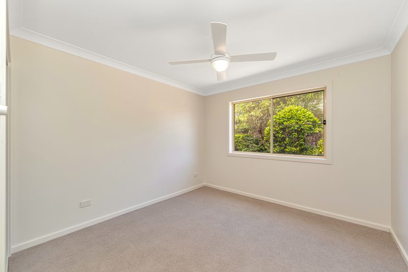 Light-Filled Home with Sunroom and Space to Live
