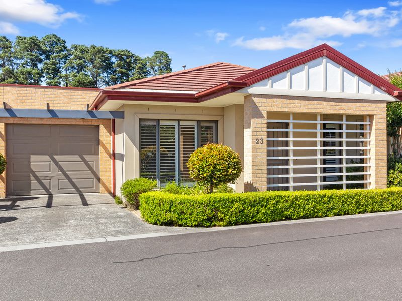 Charming Home with Stylish Updates in a Lovely Tree-Lined Setting