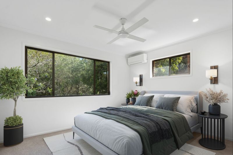 Charming two-bedroom apartment surrounded by lush greenery