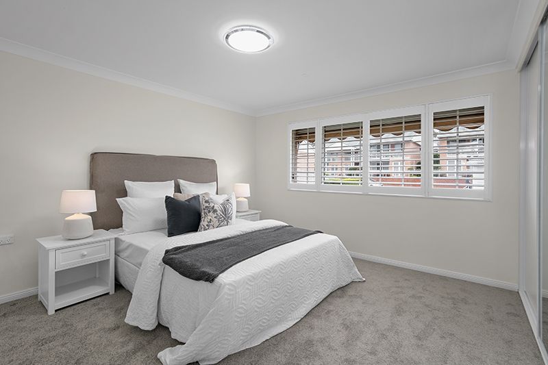 Gorgeously renovated 3 bedroom unit with modern look, level access and leafy district views.
