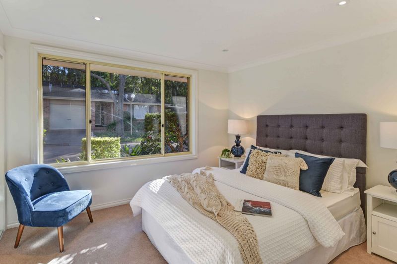 Sit back and relax on your patio! Looking onto the parkland enjoying the lifestyle here at Tarragal Glen!