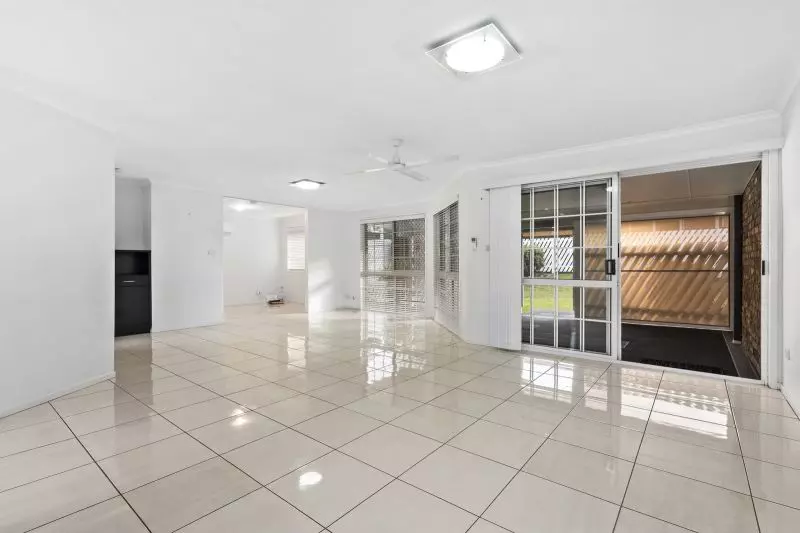 Beautiful two-bedroom, one bathroom villa with covered rear entertaining area.