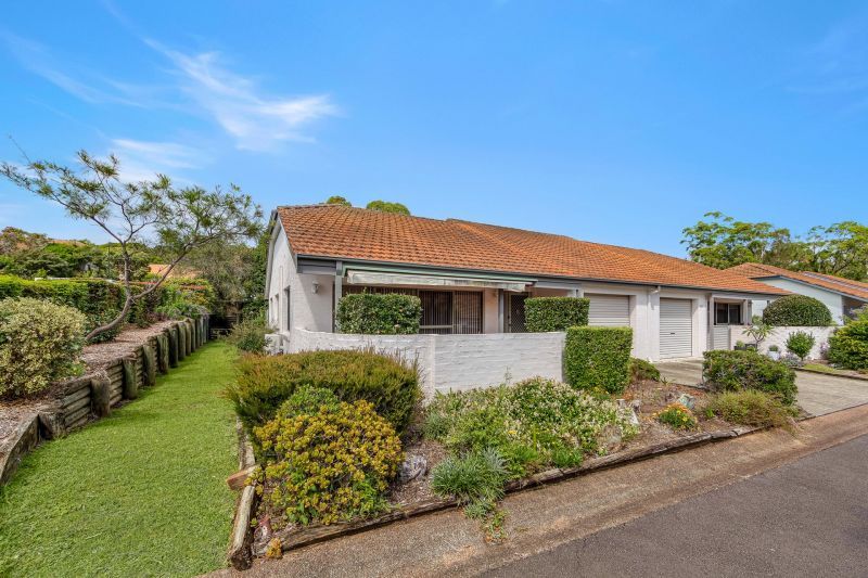 Corner Villa Living Steps from the Village Hub