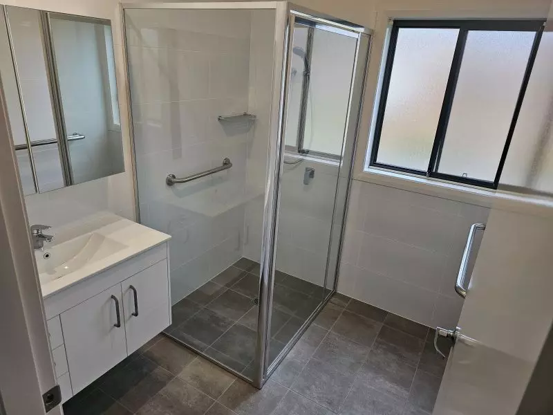 2 Bedroom + Sunroom and QLD room. North facing Lounge.