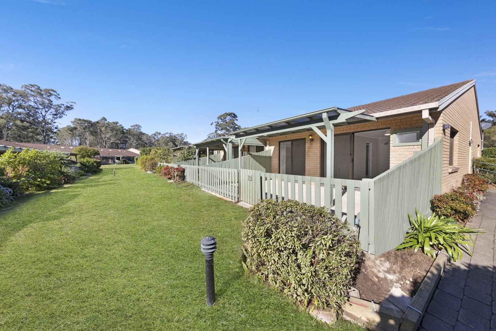 North Facing Garden Villa with Delightful Sunny Location - Completely Renovated Beauty!