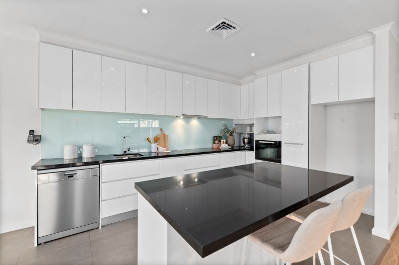 Stylishly updated two-bedroom plus study villa with delightful garden