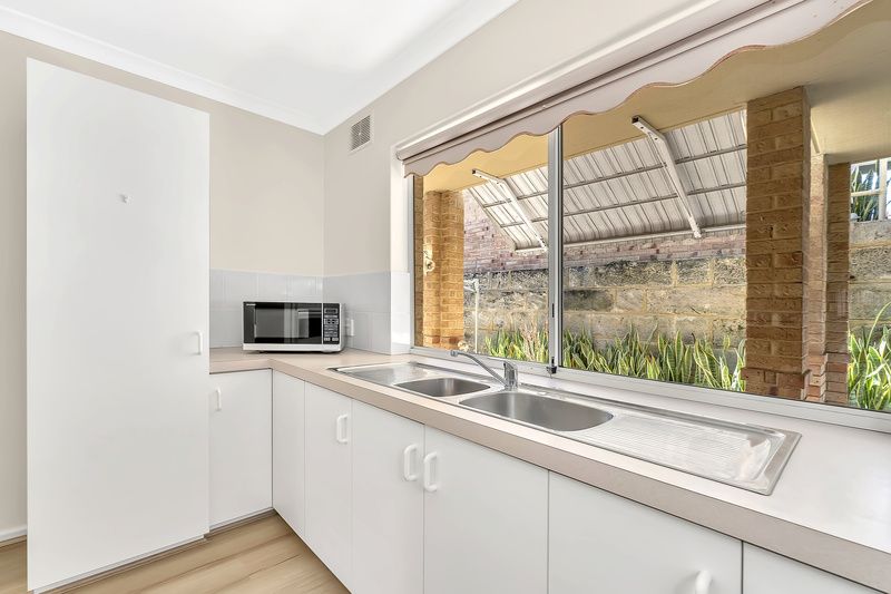 Refreshed Villa with Sunlit Patio and Open-Plan Living