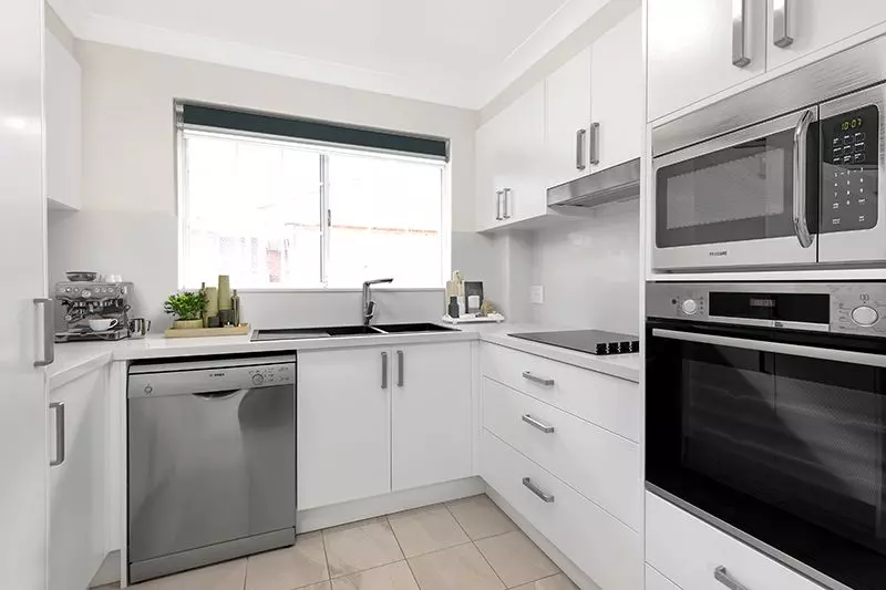 Perfectly located, renovated unit with easy ramp access and lovely district views.