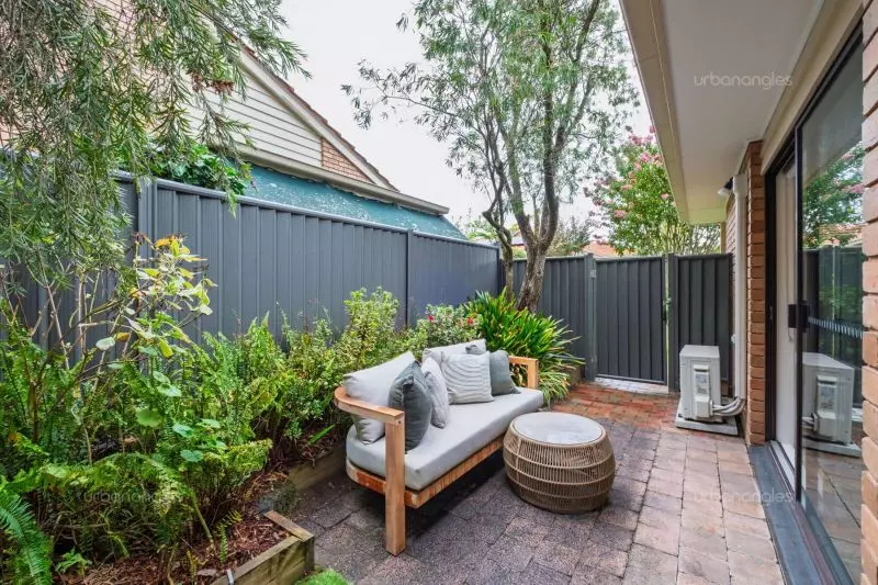 Exclusive two-bedroom villa featuring a pristine backyard