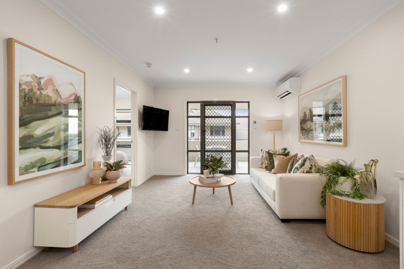 Courtyard-facing apartment on level 3 with serene views